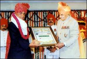 Sh. Ghanshyam Sharma honoured by Brig. Bhawani Singh